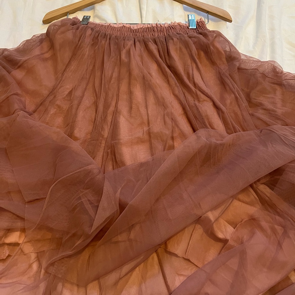 Color is rose , 3 layers, brand new never worn